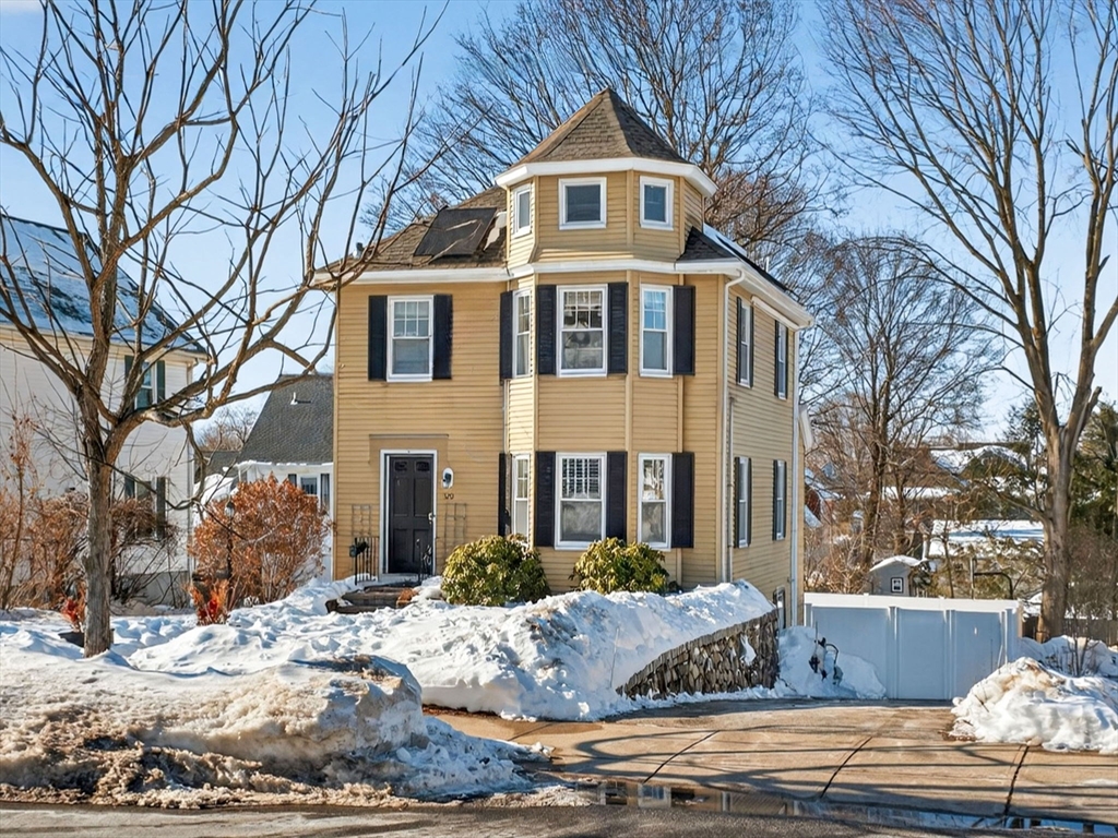 320 Washington Street Winchester, MA 01890 - Photo 1 of 35 a front view of a house with trees