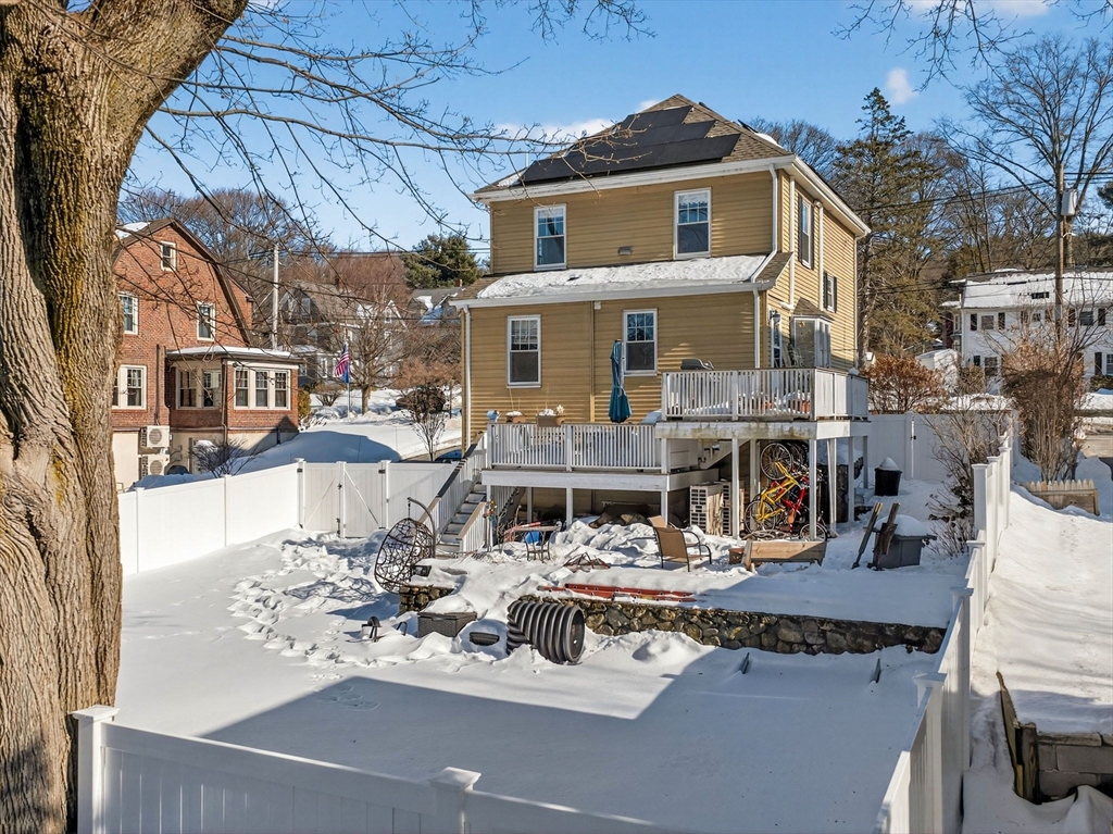 320 Washington Street Winchester, MA 01890 - Photo 27 of 35 a view of the house with roof and sitting area