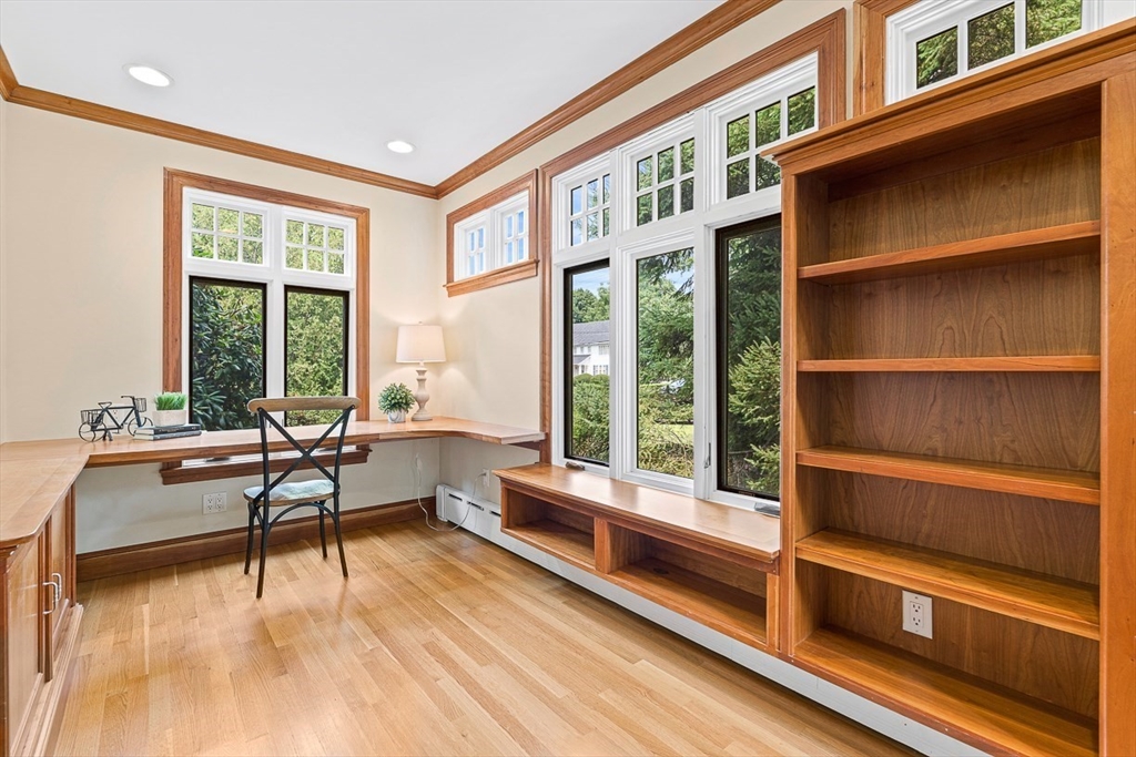 24 Calumet Road Winchester, MA 01890 - Photo 18 of 41 a living room with furniture pool table and a large window