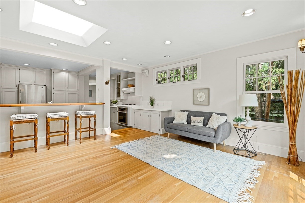 24 Calumet Road Winchester, MA 01890 - Photo 19 of 41 a living room with furniture and a table