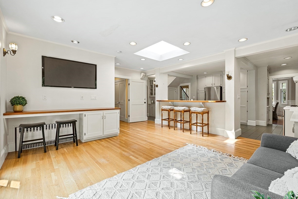 24 Calumet Road Winchester, MA 01890 - Photo 21 of 41 a living room with furniture and a flat screen tv