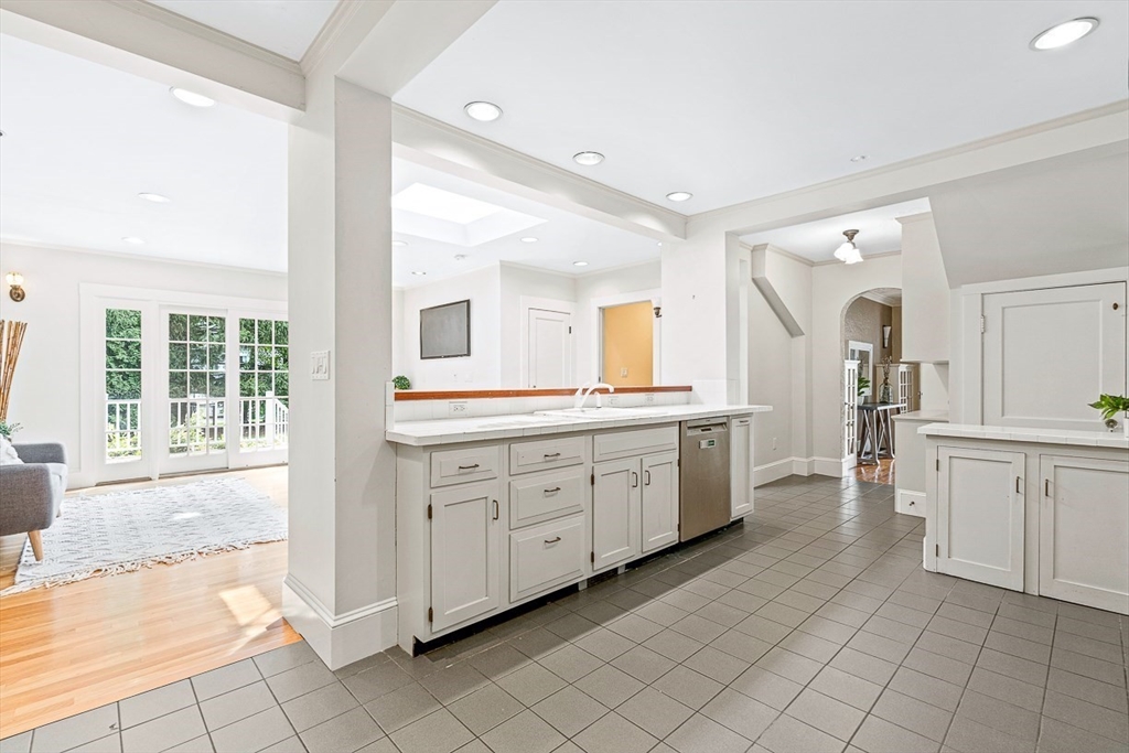 24 Calumet Road Winchester, MA 01890 - Photo 23 of 41 a large bathroom with a large mirror vanity and sink