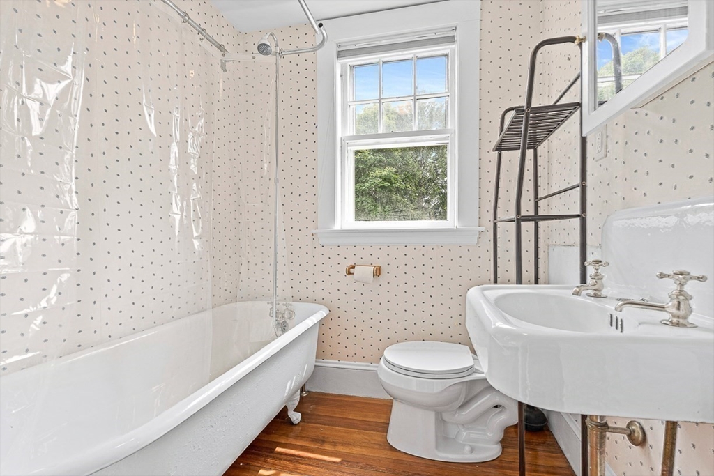 24 Calumet Road Winchester, MA 01890 - Photo 39 of 41 a bathroom with a sink toilet and bathtub