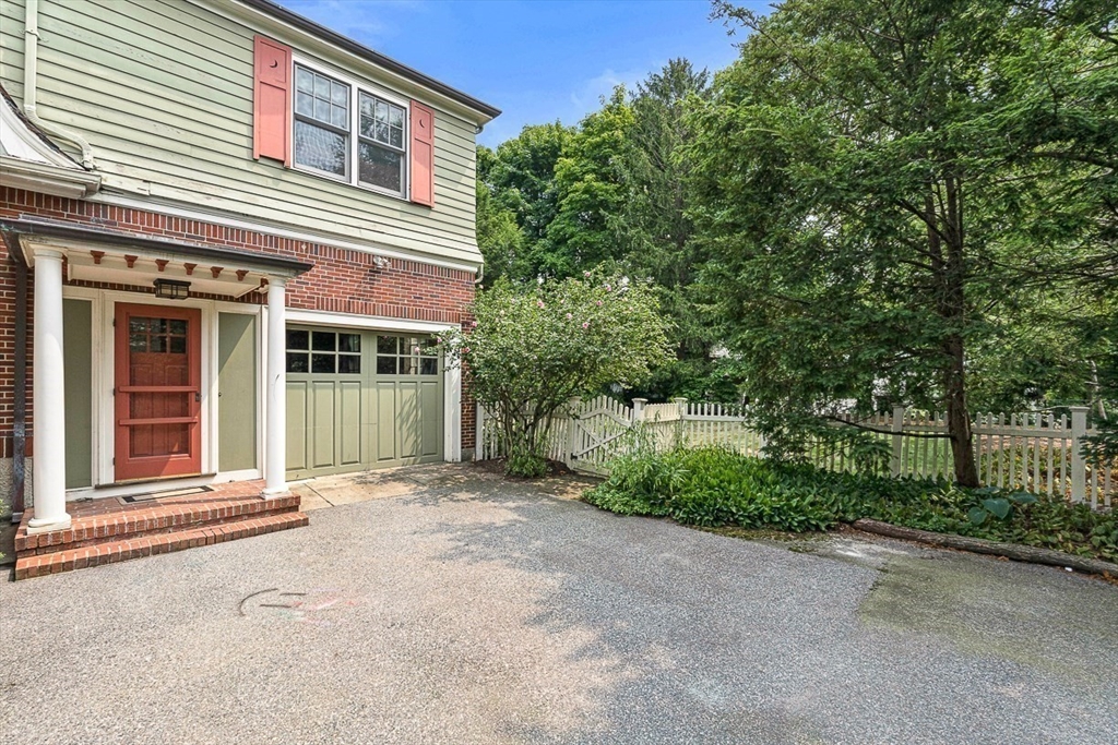 24 Calumet Road Winchester, MA 01890 - Photo 6 of 41 front view of a house with a street