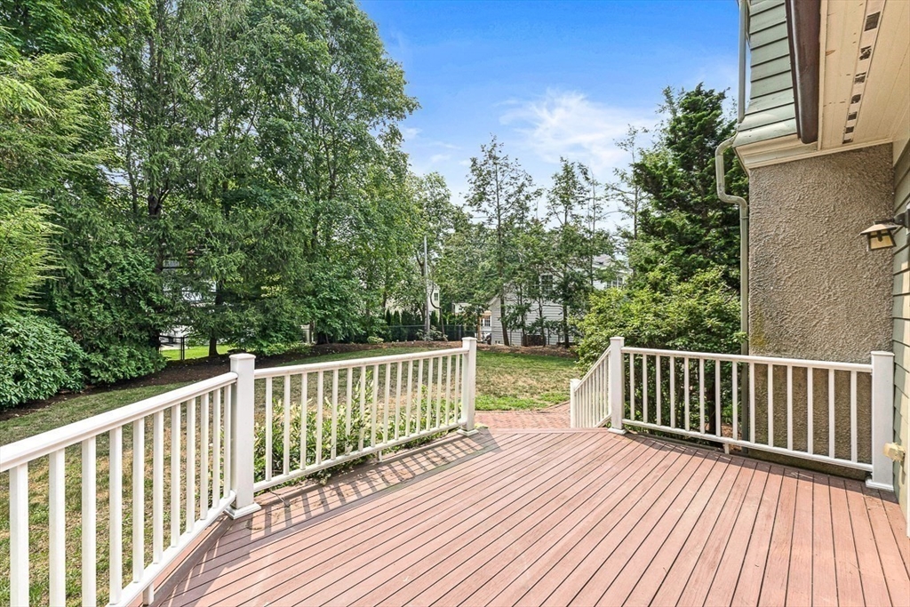 24 Calumet Road Winchester, MA 01890 - Photo 10 of 41 a view of a wooden roof deck