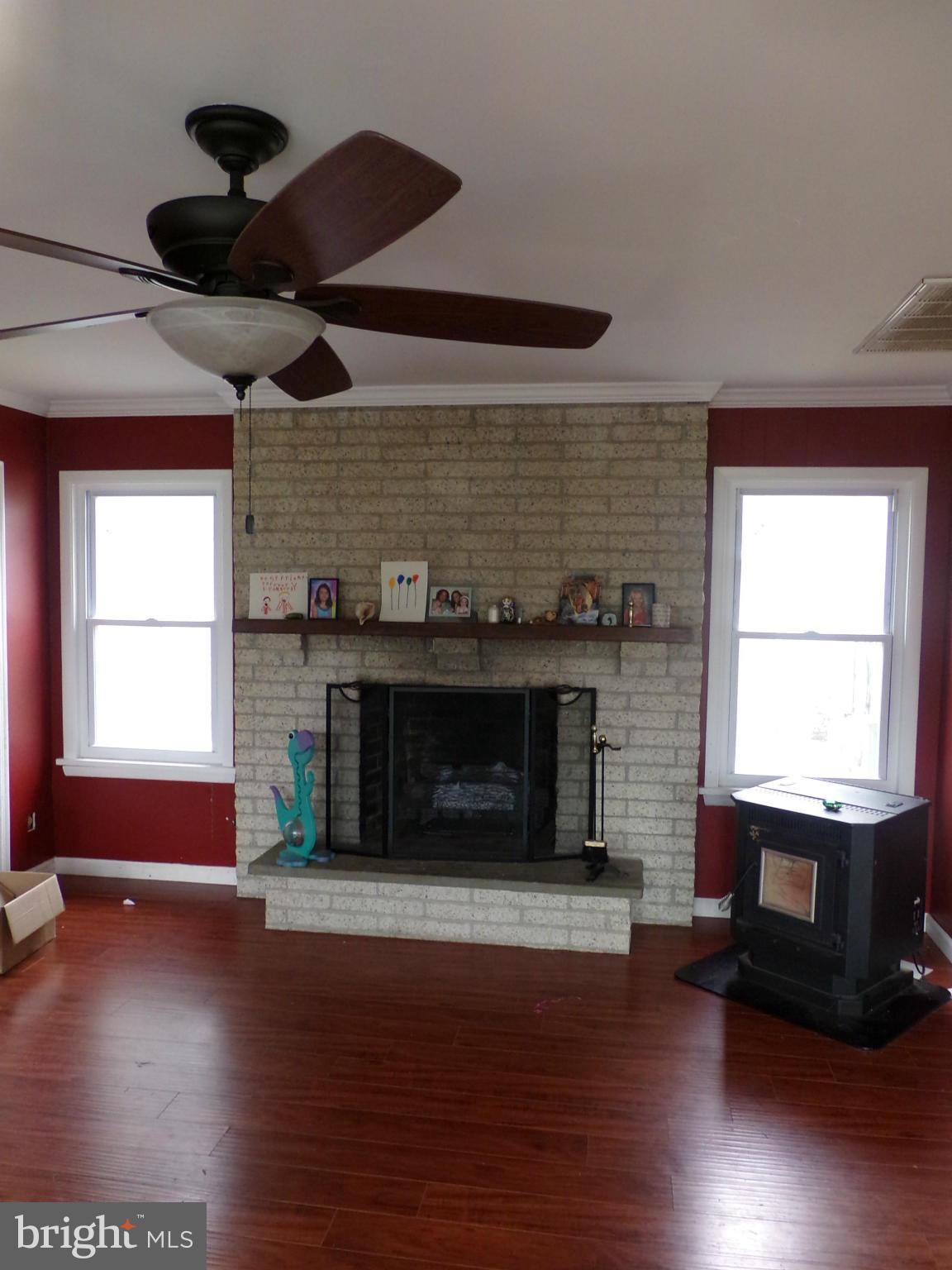 29012 Rabbit Hill Road Easton, MD 21601 - Photo 8 of 22 a living room with a fireplace