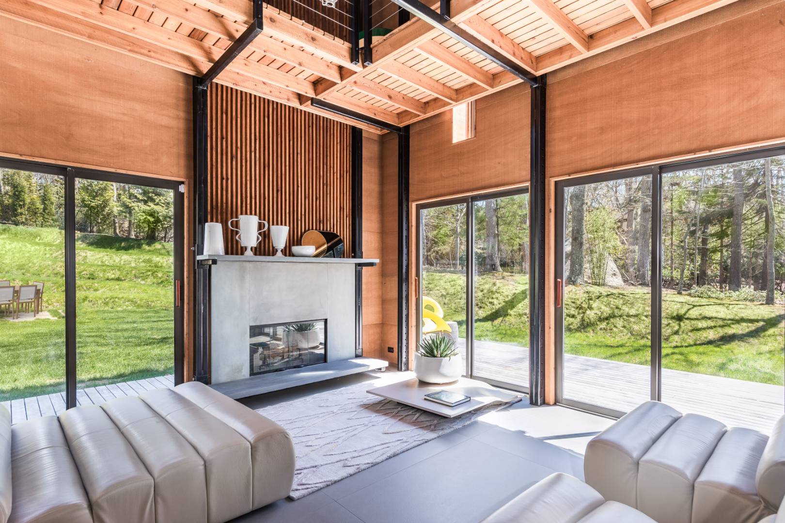 131 Windward East Hampton, NY 11937 - Photo 2 of 22 a bedroom with furniture and a fireplace