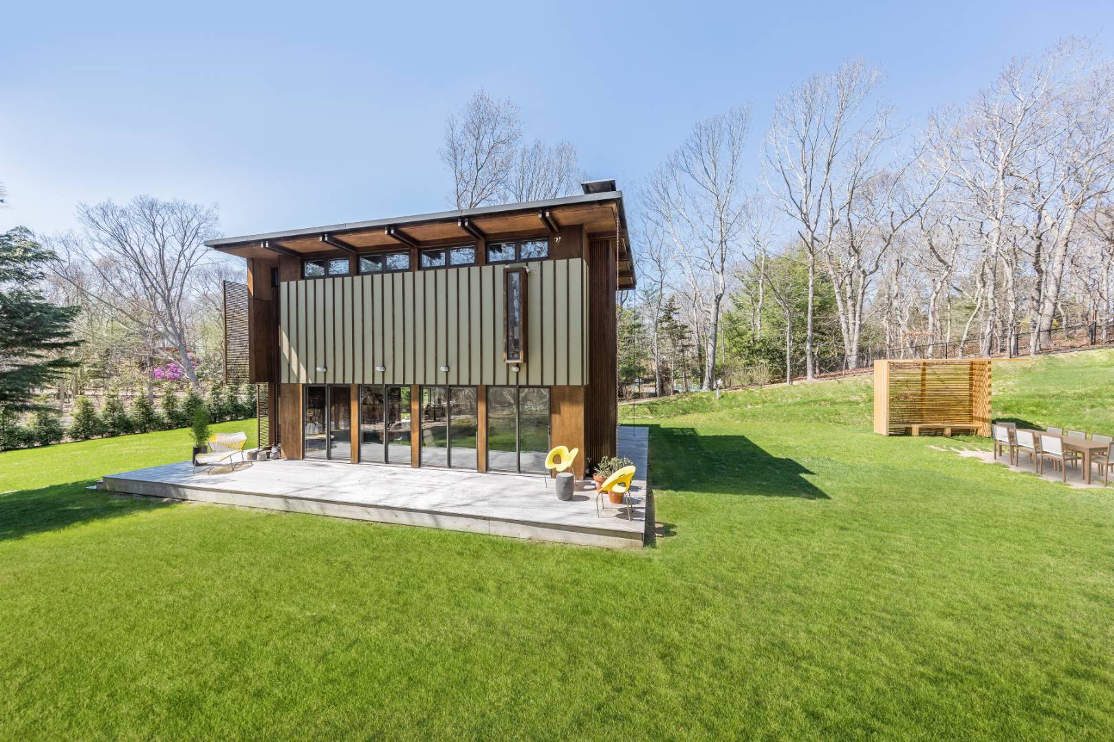 131 Windward East Hampton, NY 11937 - Photo 20 of 22 a view of a backyard with a slide