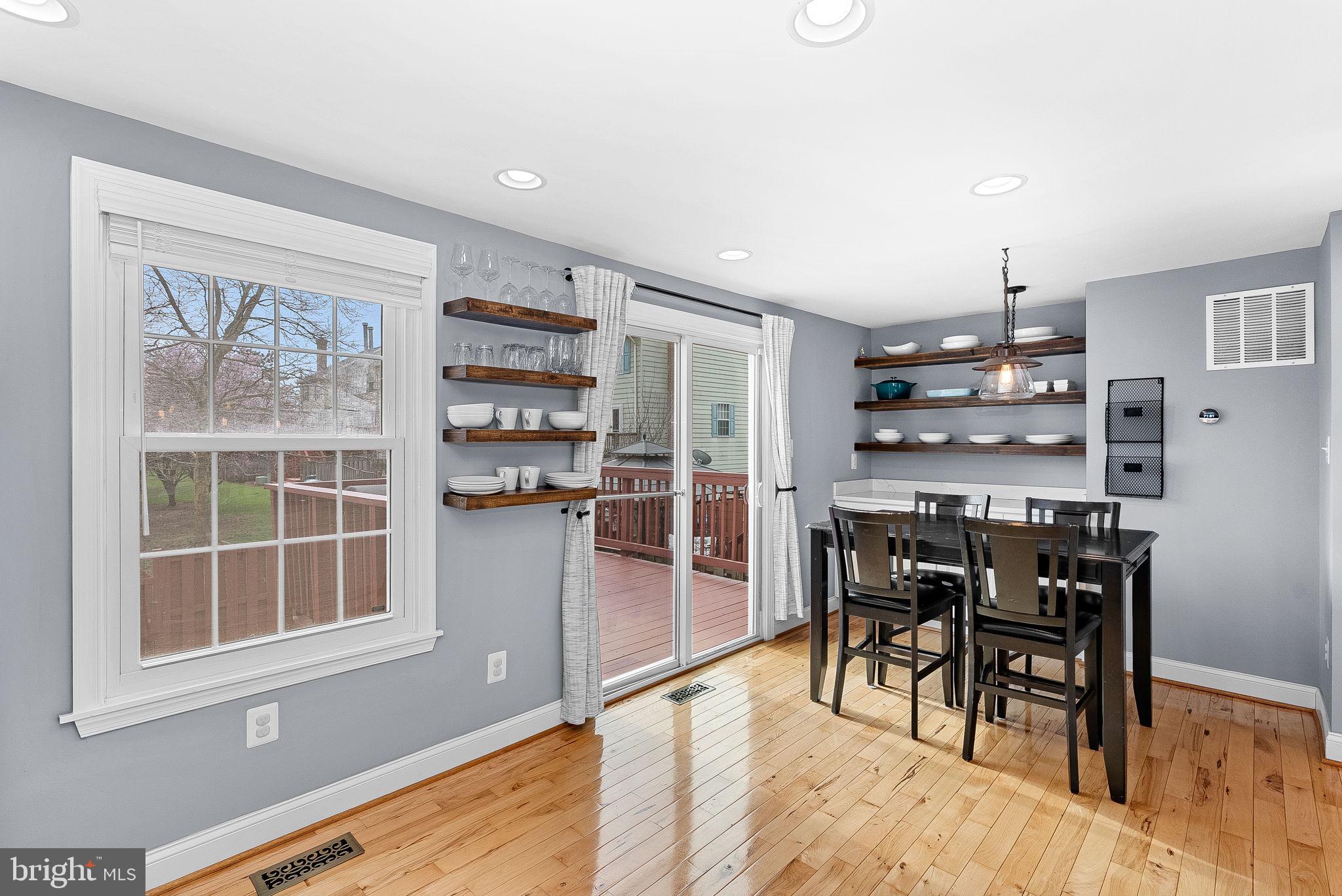 43983 Choptank Terrace Ashburn, VA 20147 - Photo 13 of 43 a view of a dining room with furniture and window