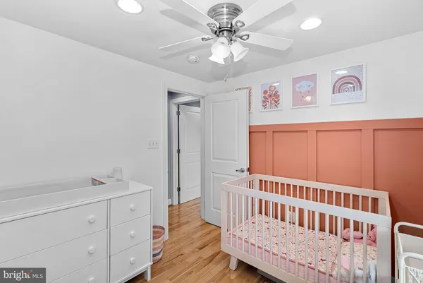 a view of a hallway with a bedroom