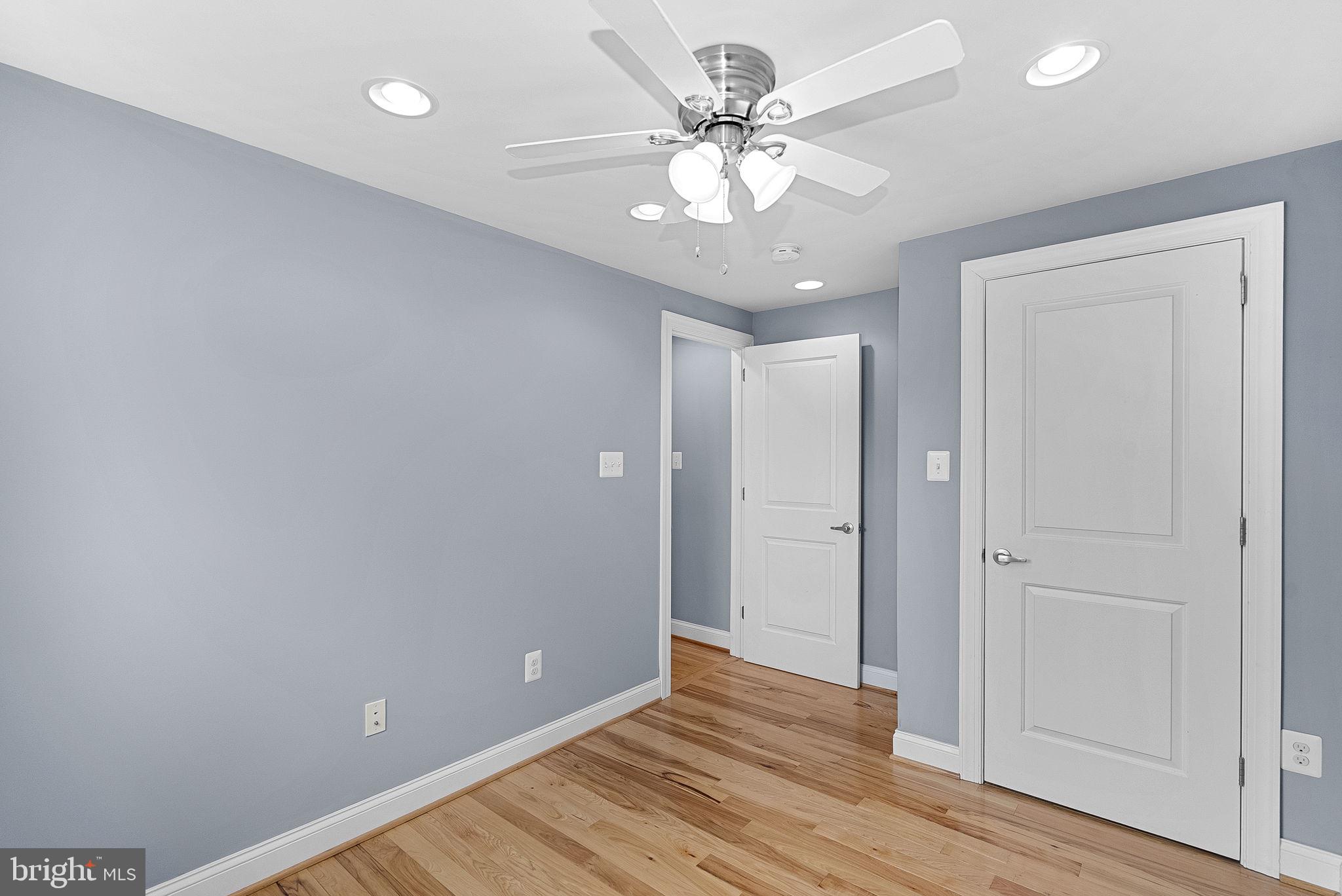 43983 Choptank Terrace Ashburn, VA 20147 - Photo 25 of 43 a view of an empty room with wooden floor