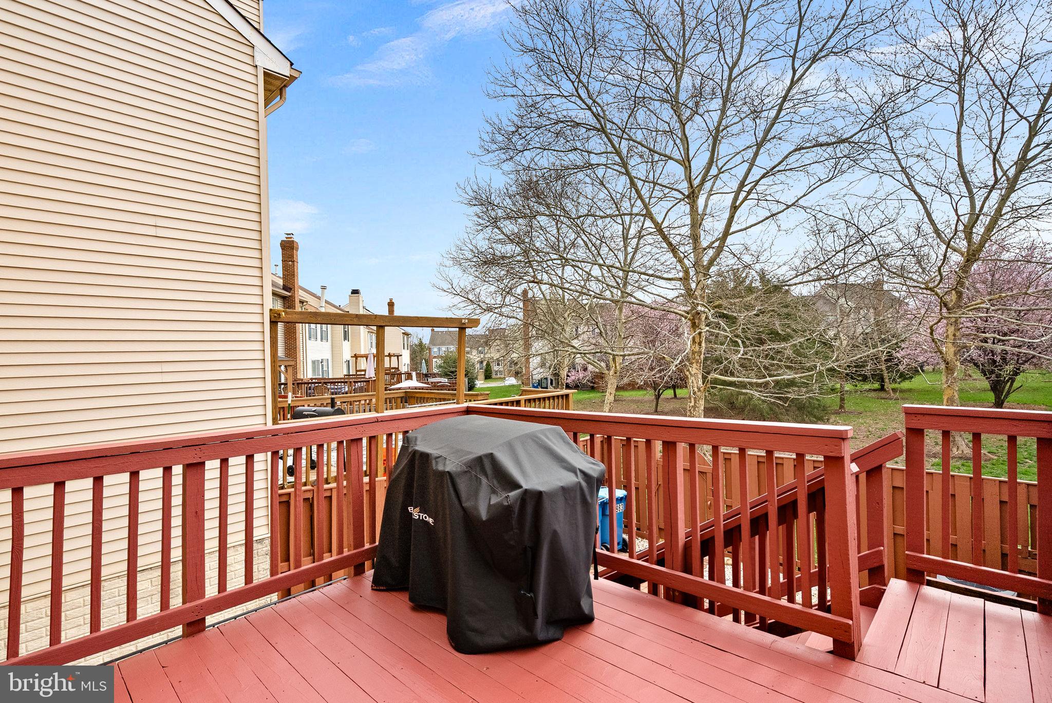 43983 Choptank Terrace Ashburn, VA 20147 - Photo 31 of 43 a view of balcony with wooden floor and fence
