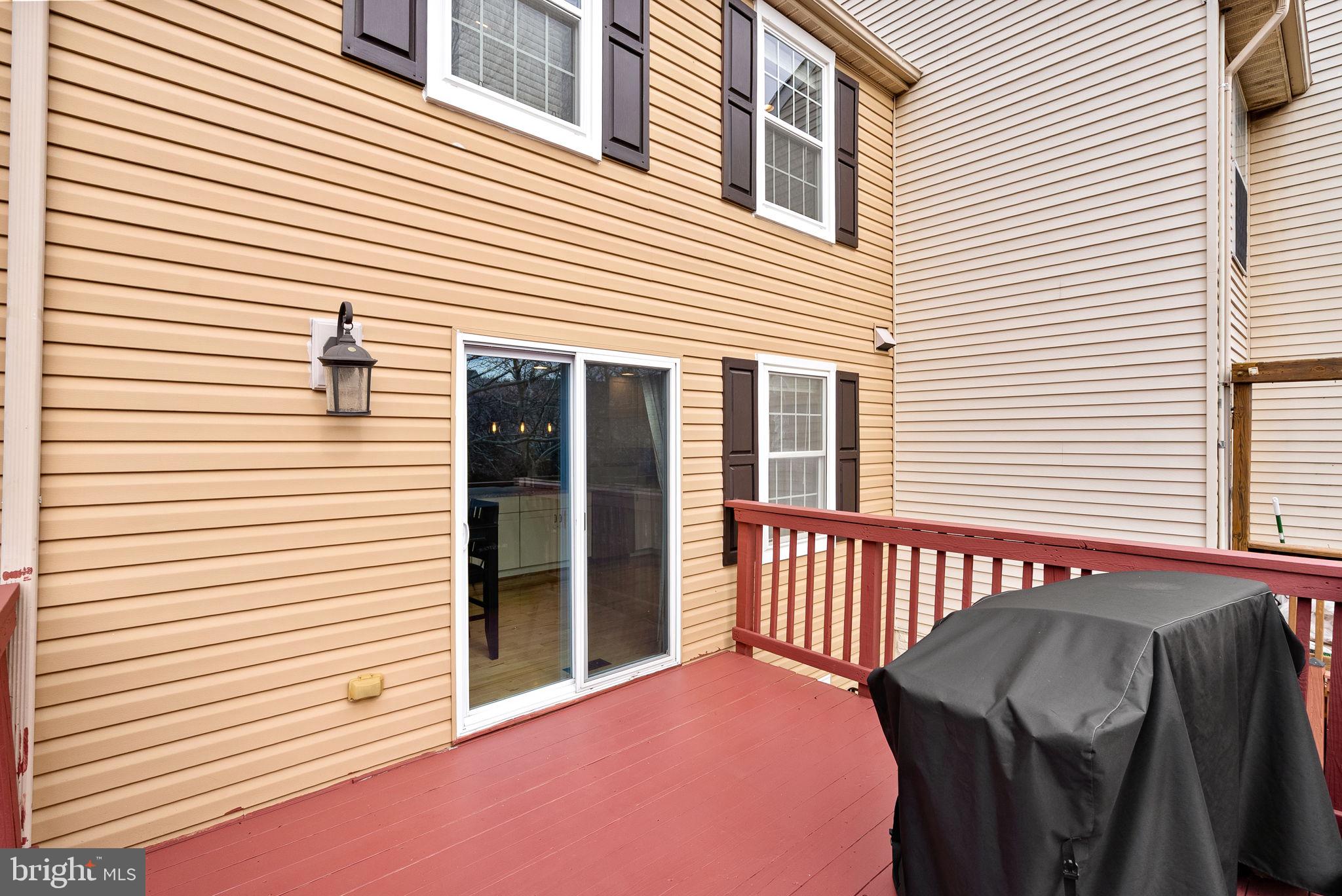 43983 Choptank Terrace Ashburn, VA 20147 - Photo 34 of 43 a front view of a house with a porch