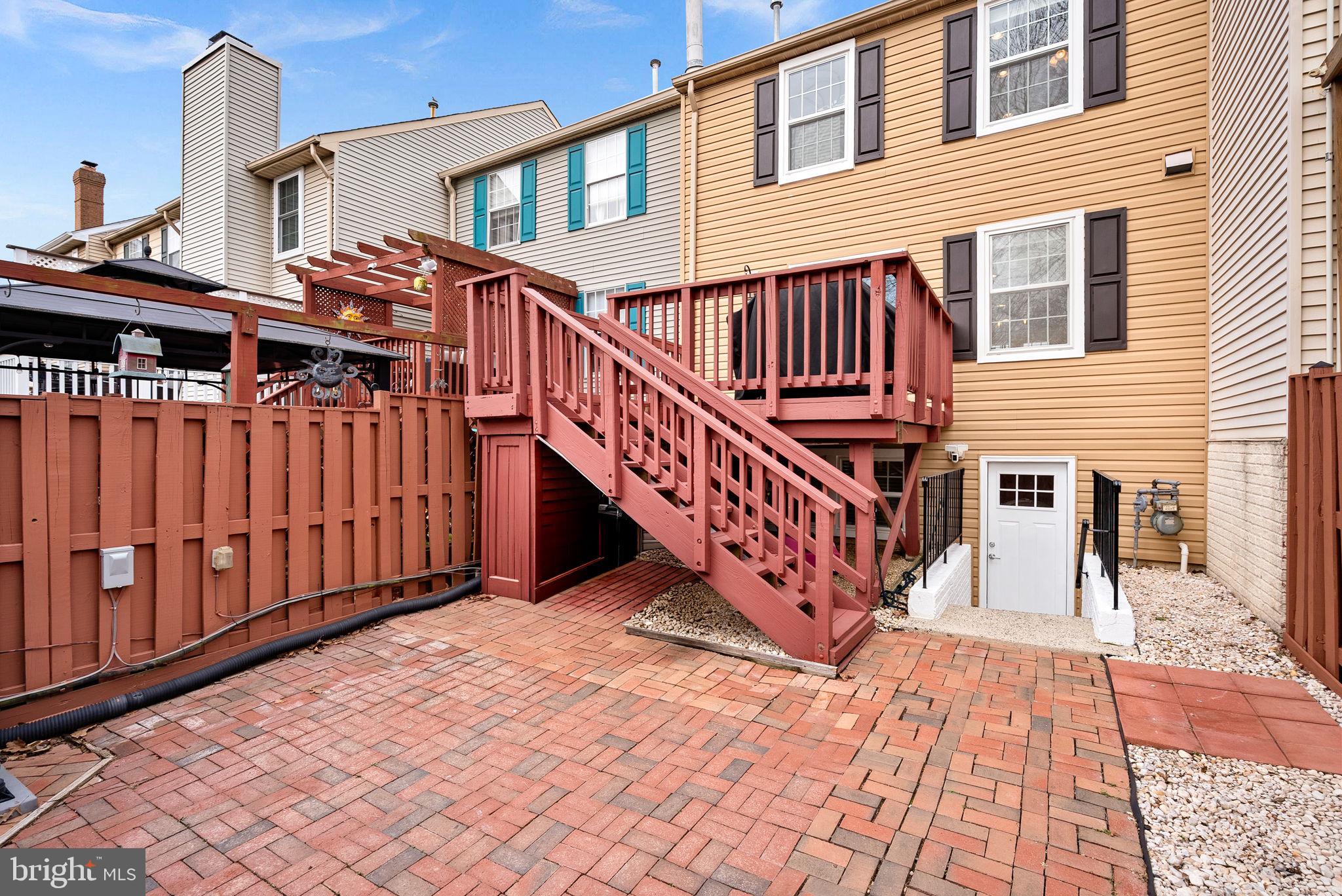 43983 Choptank Terrace Ashburn, VA 20147 - Photo 37 of 43 a view of a house with wooden deck