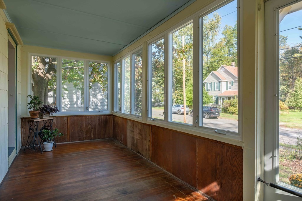 22 Liberty Street Northampton, MA 01062 - Photo 3 of 19 a view of an empty room with wooden floor and a window