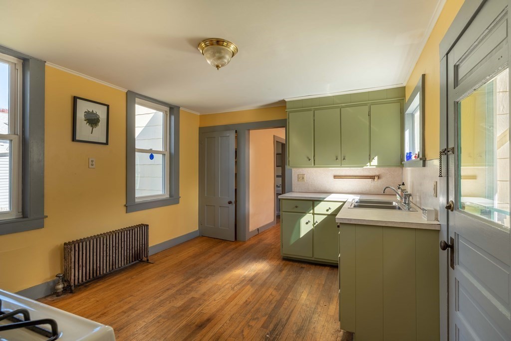 22 Liberty Street Northampton, MA 01062 - Photo 10 of 19 a room with a bed and a desk