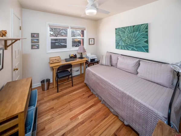 a bathroom with a toilet sink and shower