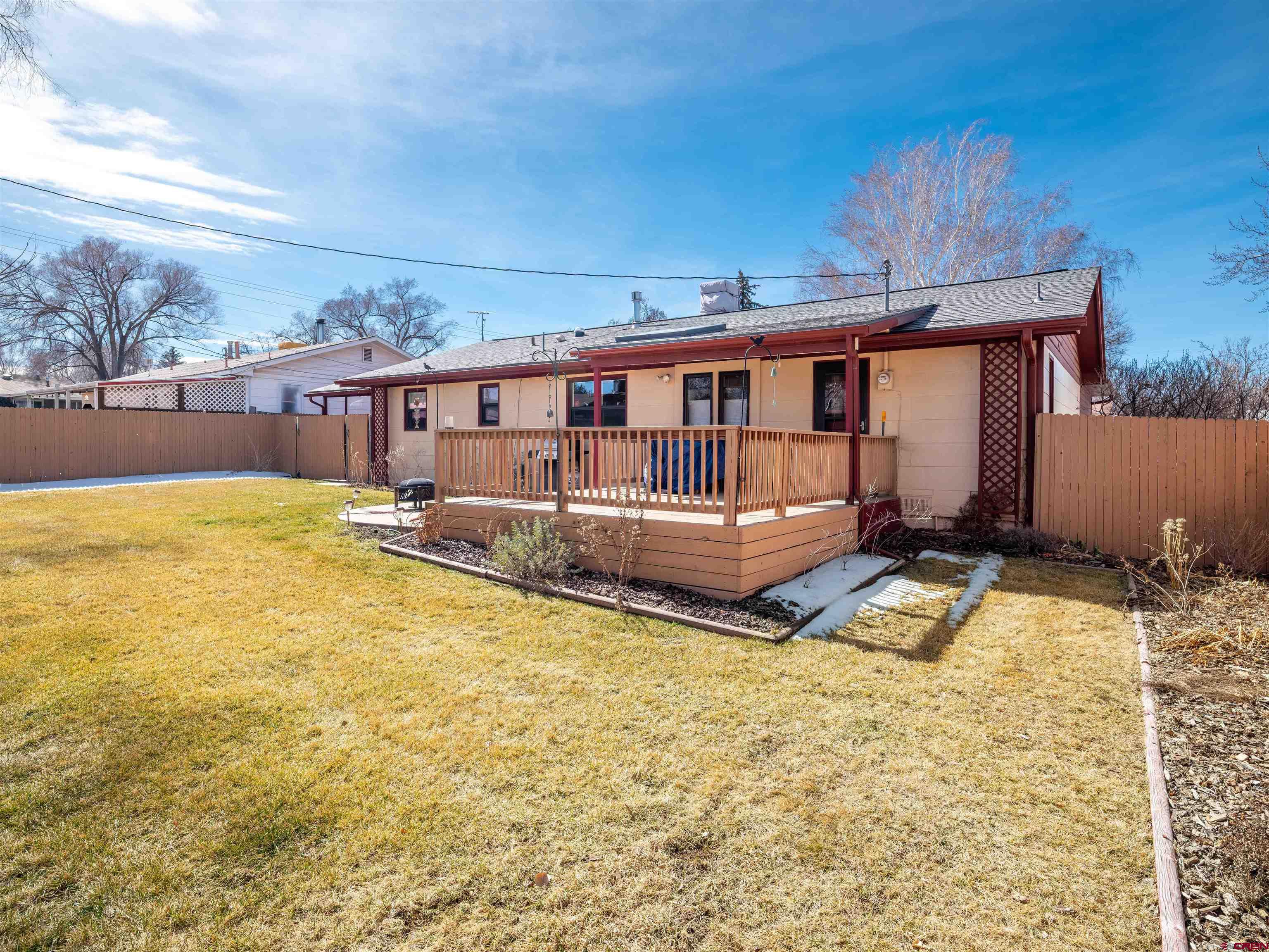 710 Wedgewood Street Cortez, CO 81321 - Photo 25 of 30 a view of a house with swimming pool