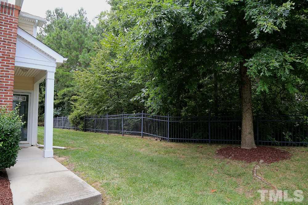 3715 Ramblewood Avenue Durham, NC 27713 - Photo 2 of 22 a backyard of a house with lots of green space