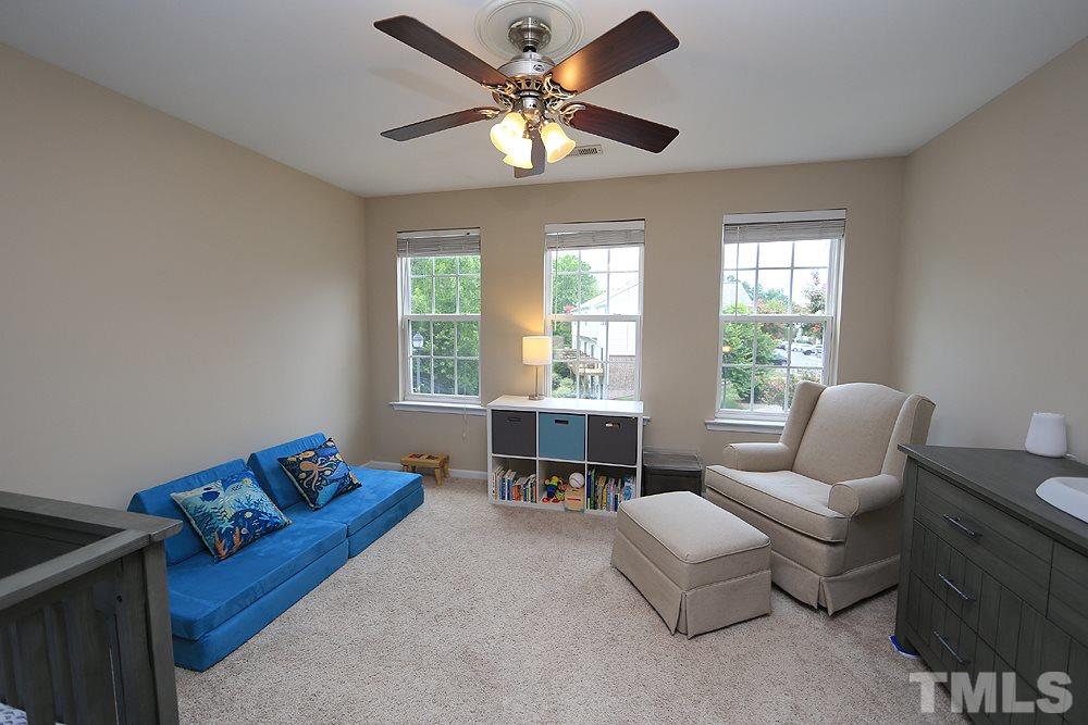 3715 Ramblewood Avenue Durham, NC 27713 - Photo 17 of 22 a living room with furniture and a large window