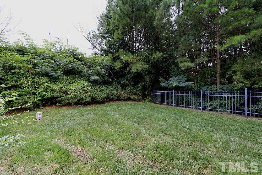 3715 Ramblewood Avenue Durham, NC 27713 - Photo 20 of 22 a view of a backyard with fence