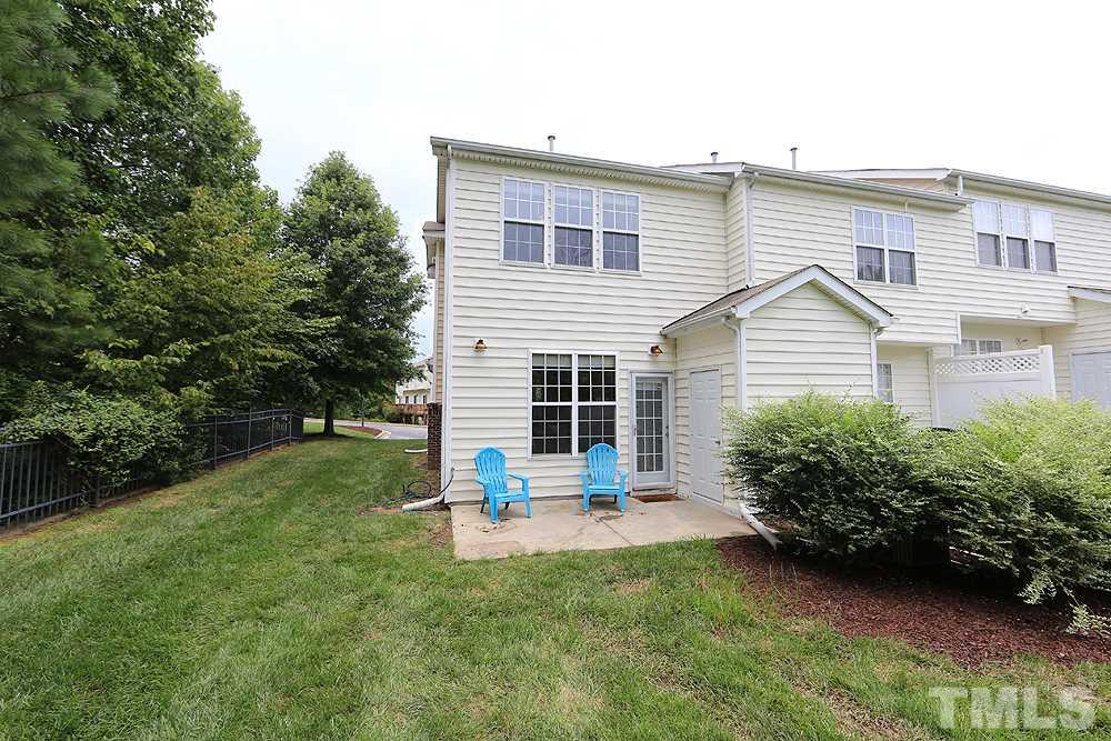 3715 Ramblewood Avenue Durham, NC 27713 - Photo 22 of 22 a view of a house with backyard and sitting area