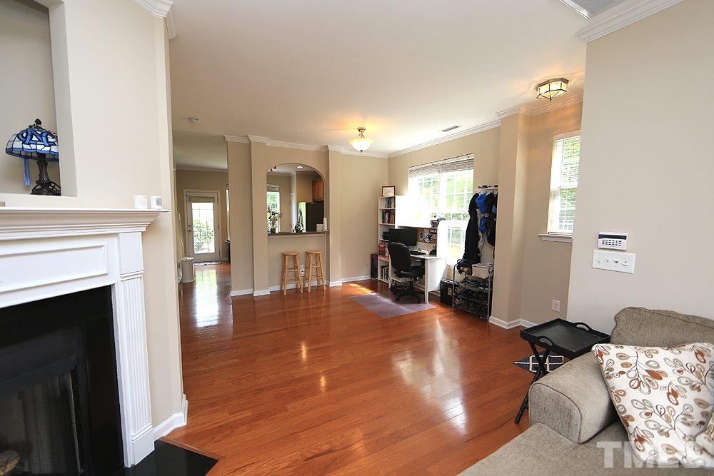3715 Ramblewood Avenue Durham, NC 27713 - Photo 8 of 22 a view of a livingroom with furniture and wooden floor