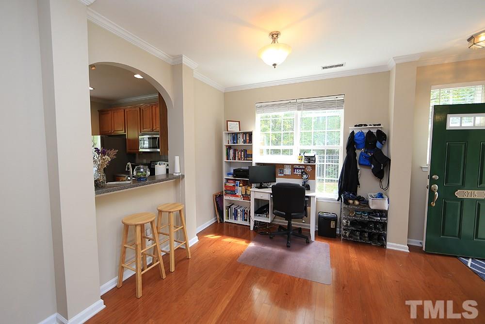 3715 Ramblewood Avenue Durham, NC 27713 - Photo 9 of 22 a view of a livingroom with furniture and a window