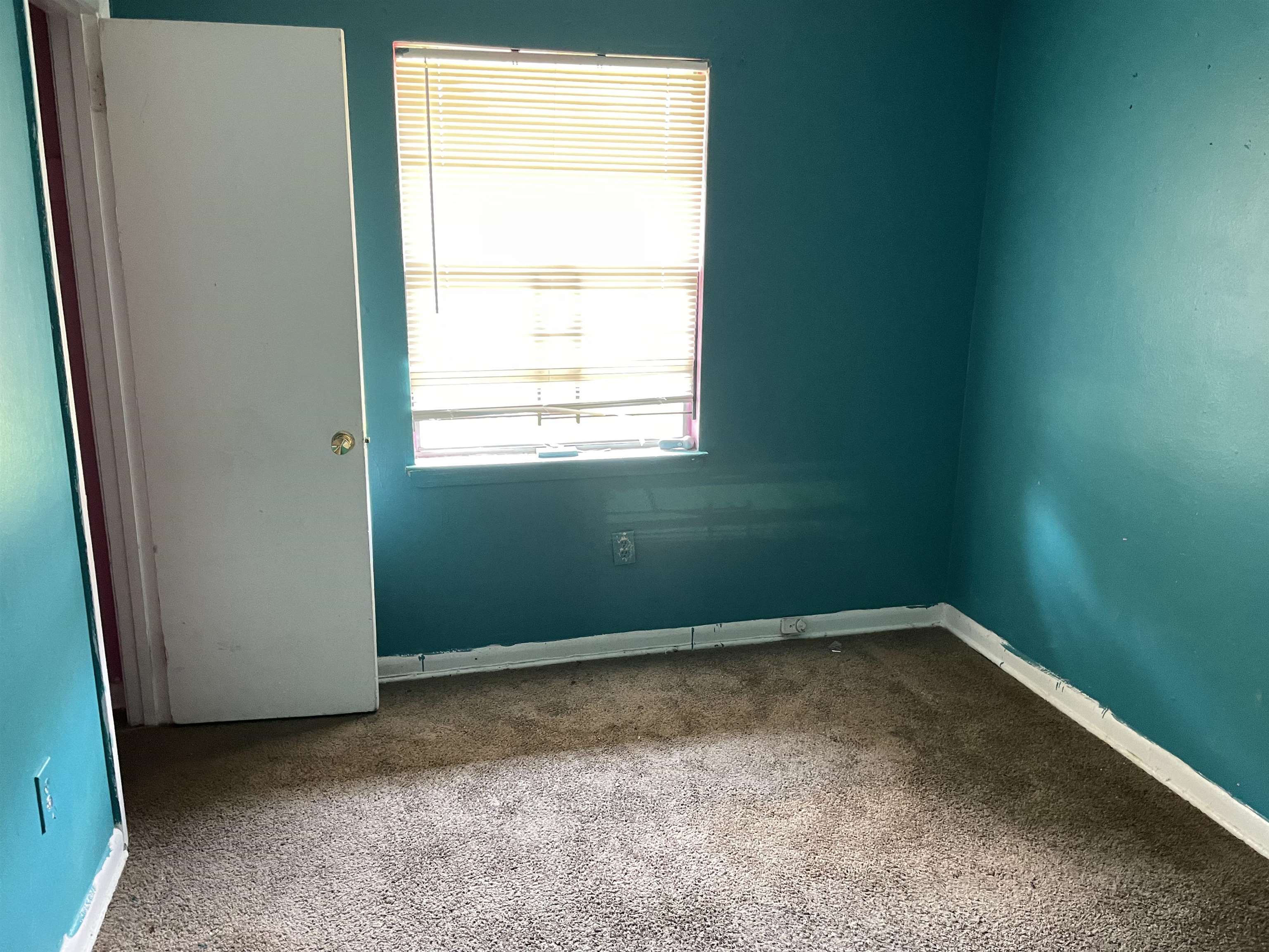 4448 Bluebell Street Memphis, TN 38109 - Photo 14 of 18 a view of a small space with a window