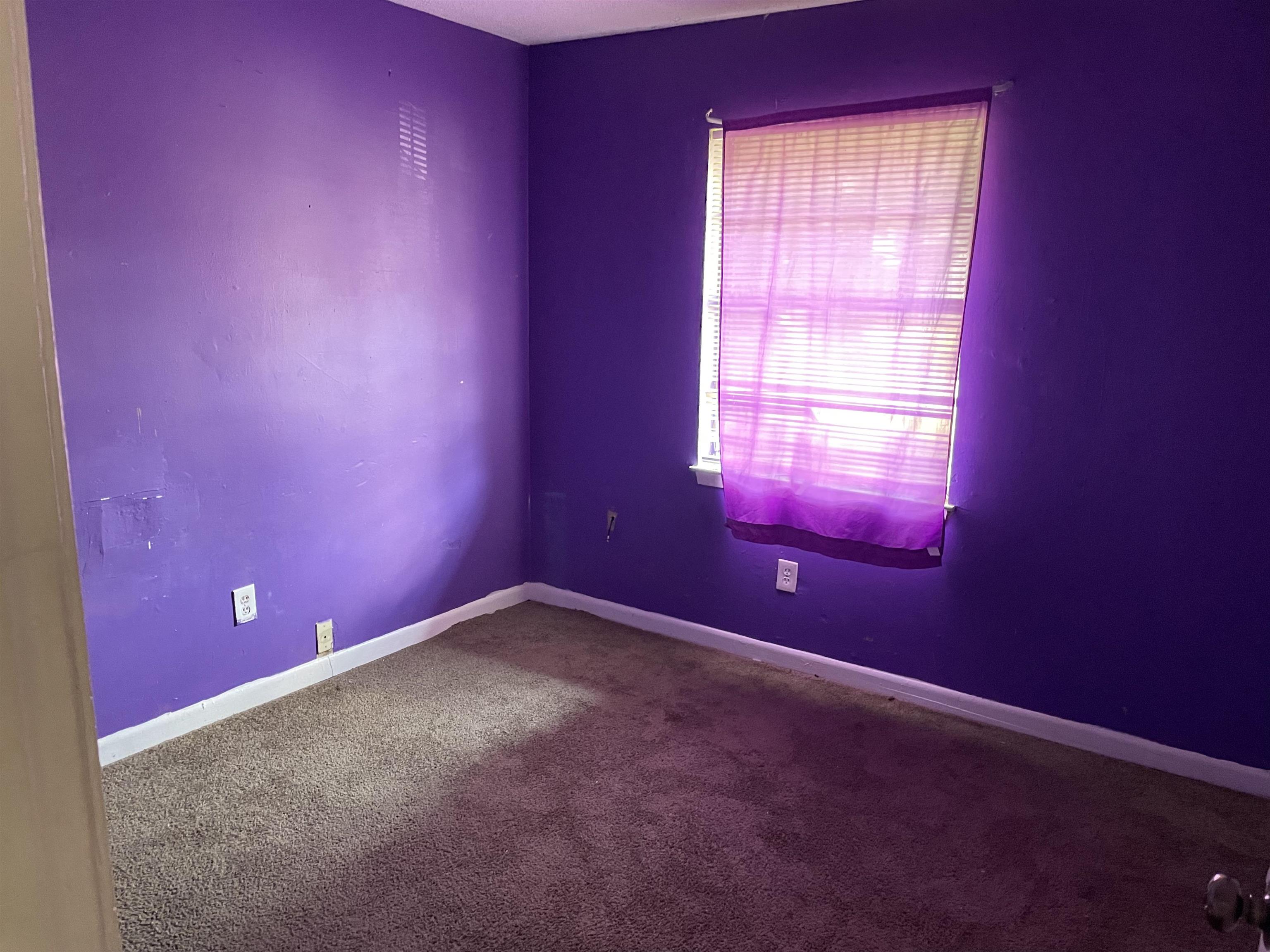4448 Bluebell Street Memphis, TN 38109 - Photo 15 of 18 an empty room that has a window