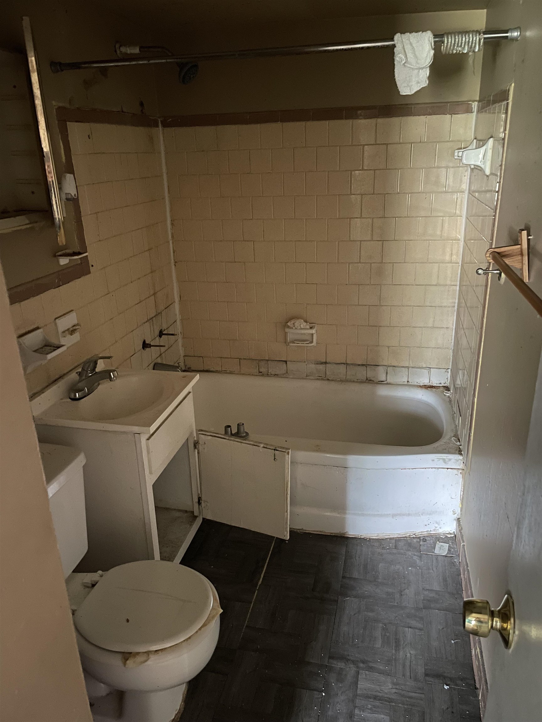 4448 Bluebell Street Memphis, TN 38109 - Photo 16 of 18 a bathroom with a sink a toilet and shower