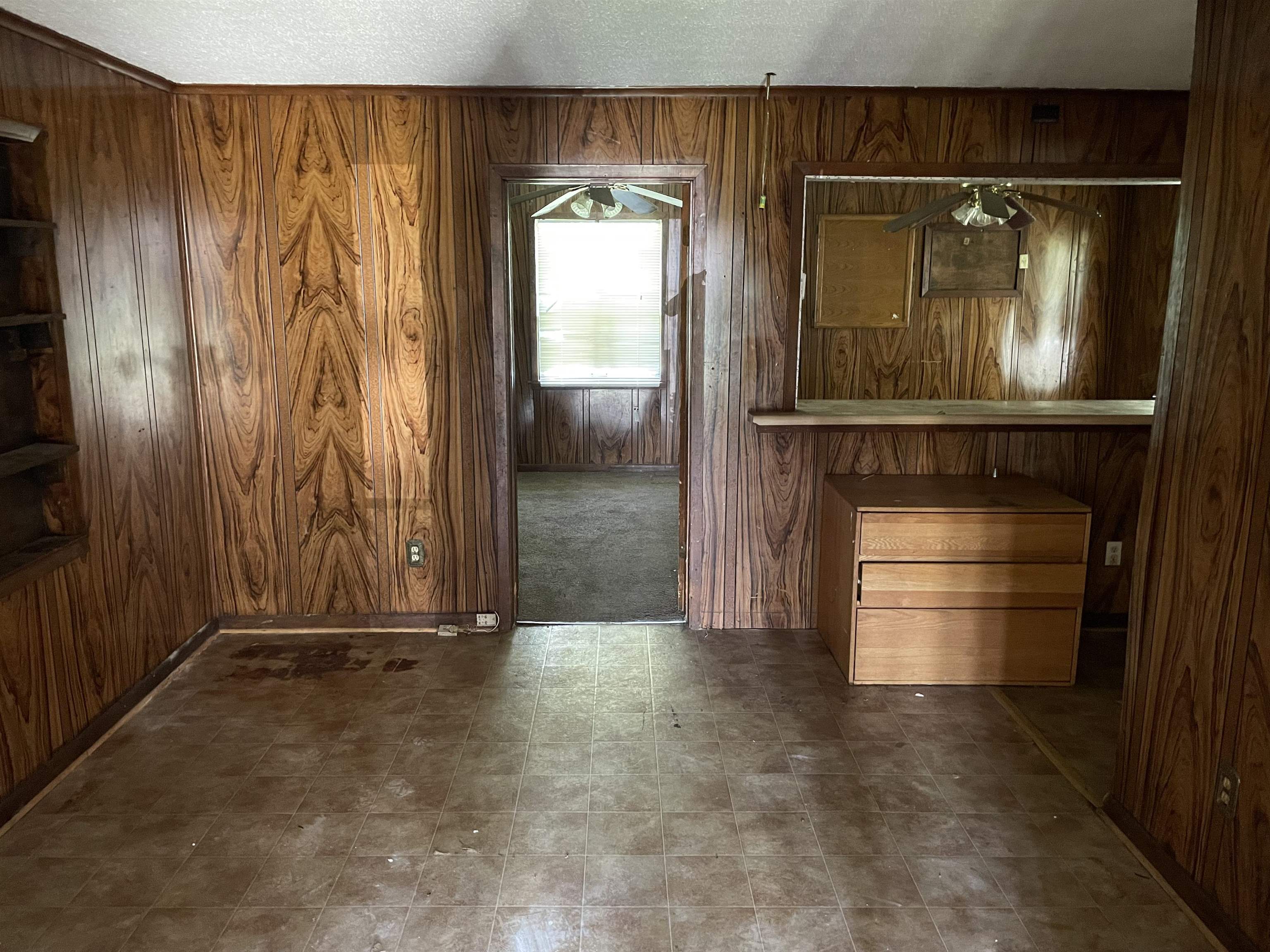 4448 Bluebell Street Memphis, TN 38109 - Photo 5 of 18 a room with a door and a wooden door