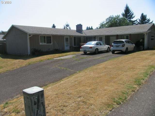 a car parked in front of a house