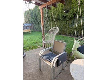 35 Northeast 157th Avenue Portland, OR 97230 - Photo 16 of 30 a view of a yard in front of house with outdoor seating