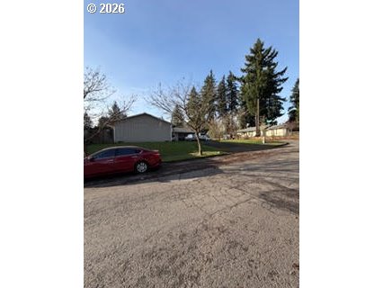 35 Northeast 157th Avenue Portland, OR 97230 - Photo 19 of 30 a view of backyard with parked car