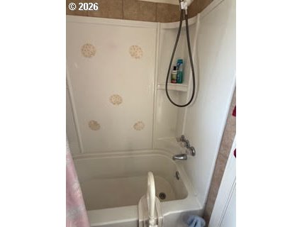 35 Northeast 157th Avenue Portland, OR 97230 - Photo 25 of 30 a bathroom with a granite countertop shower and a sink