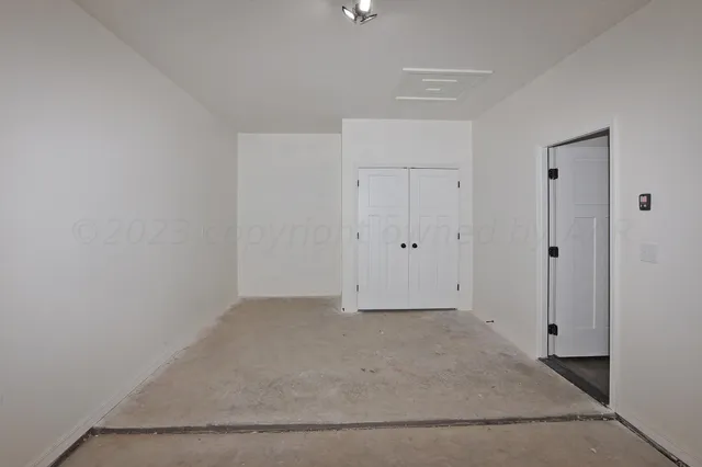 a view of a room with an empty space