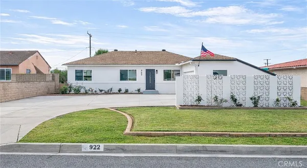 a view of a house with a big yard