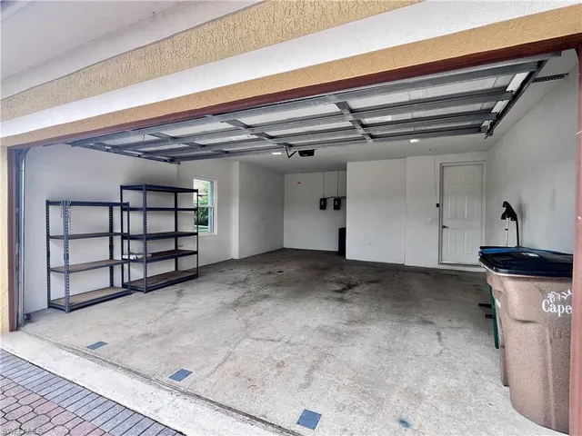 a outdoor view of a house with sitting area