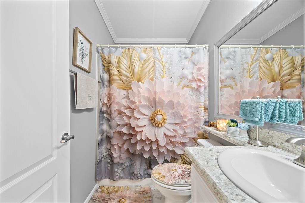 1890 Southwest 83rd Terrace Davie, FL 33324 - Photo 12 of 46 a bathroom with a sink toilet and shower