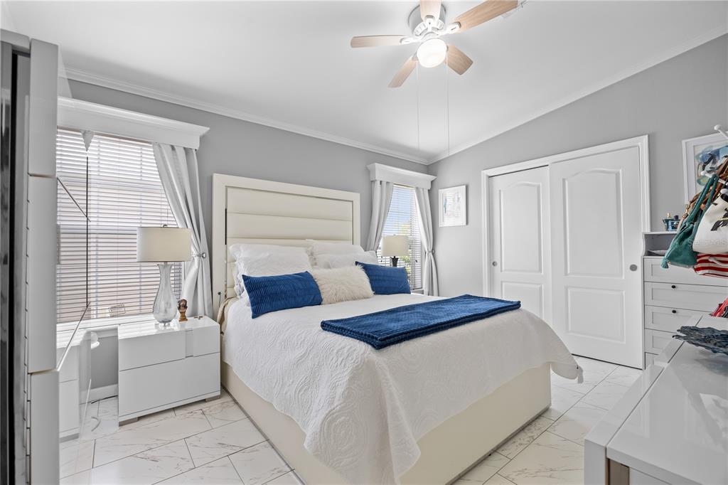 1890 Southwest 83rd Terrace Davie, FL 33324 - Photo 16 of 46 a bedroom with a bed and a large window