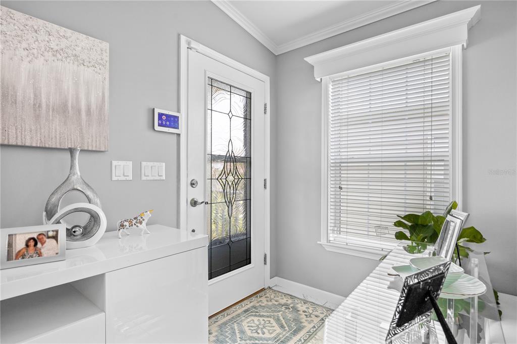 1890 Southwest 83rd Terrace Davie, FL 33324 - Photo 2 of 46 a view of a bedroom with a bed and a window