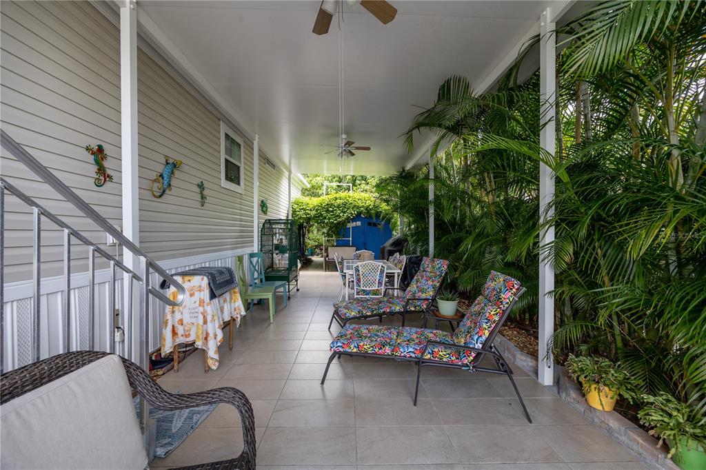 1890 Southwest 83rd Terrace Davie, FL 33324 - Photo 27 of 46 a backyard of a house with seating space