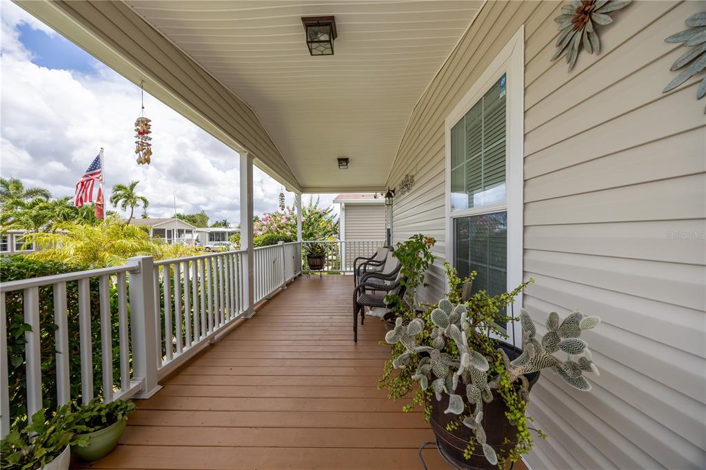 1890 Southwest 83rd Terrace Davie, FL 33324 - Photo 28 of 46 a view of a porch with wooden floor