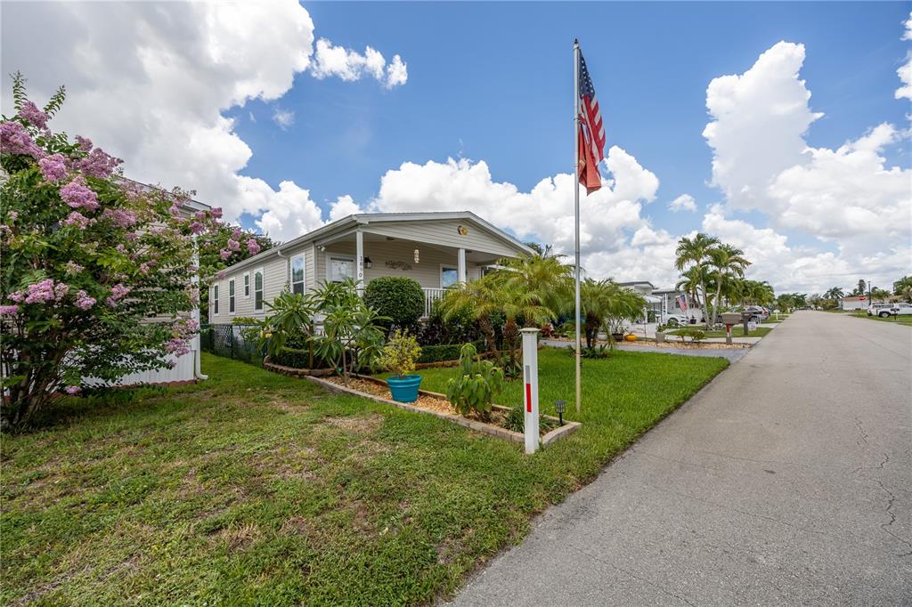 1890 Southwest 83rd Terrace Davie, FL 33324 - Photo 34 of 46 a view of a house with a big yard and large trees