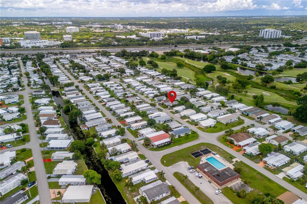 1890 Southwest 83rd Terrace Davie, FL 33324 - Photo 45 of 46 an aerial view of residential houses with outdoor space