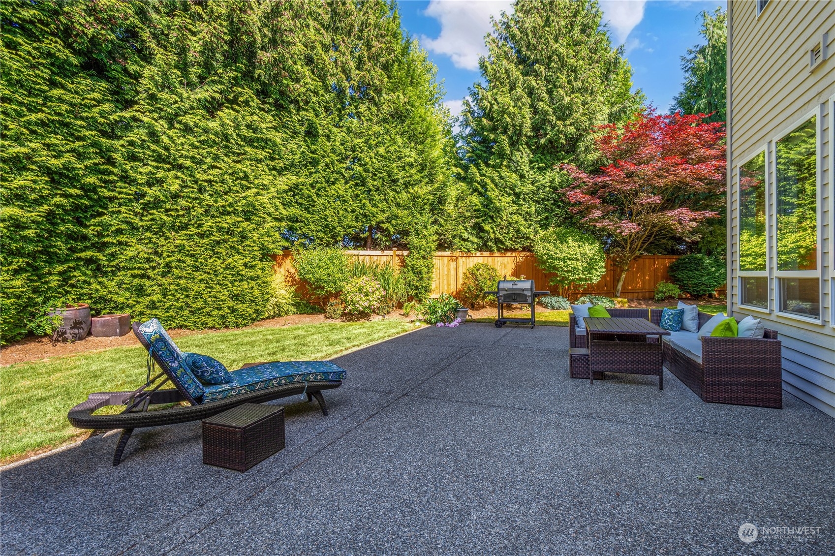 20619 38th Drive Southeast Bothell, WA 98021 - Photo 5 of 31 a view of a patio with table and chairs