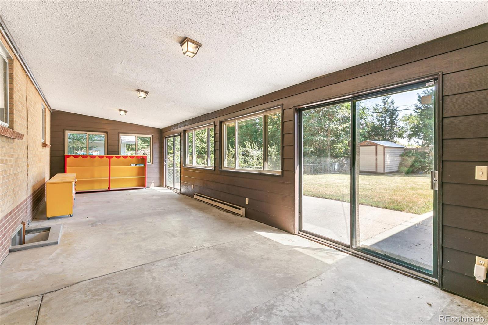 4650 Reed Street Wheat Ridge, CO 80033 - Photo 23 of 40 a view of an empty room and a balcony