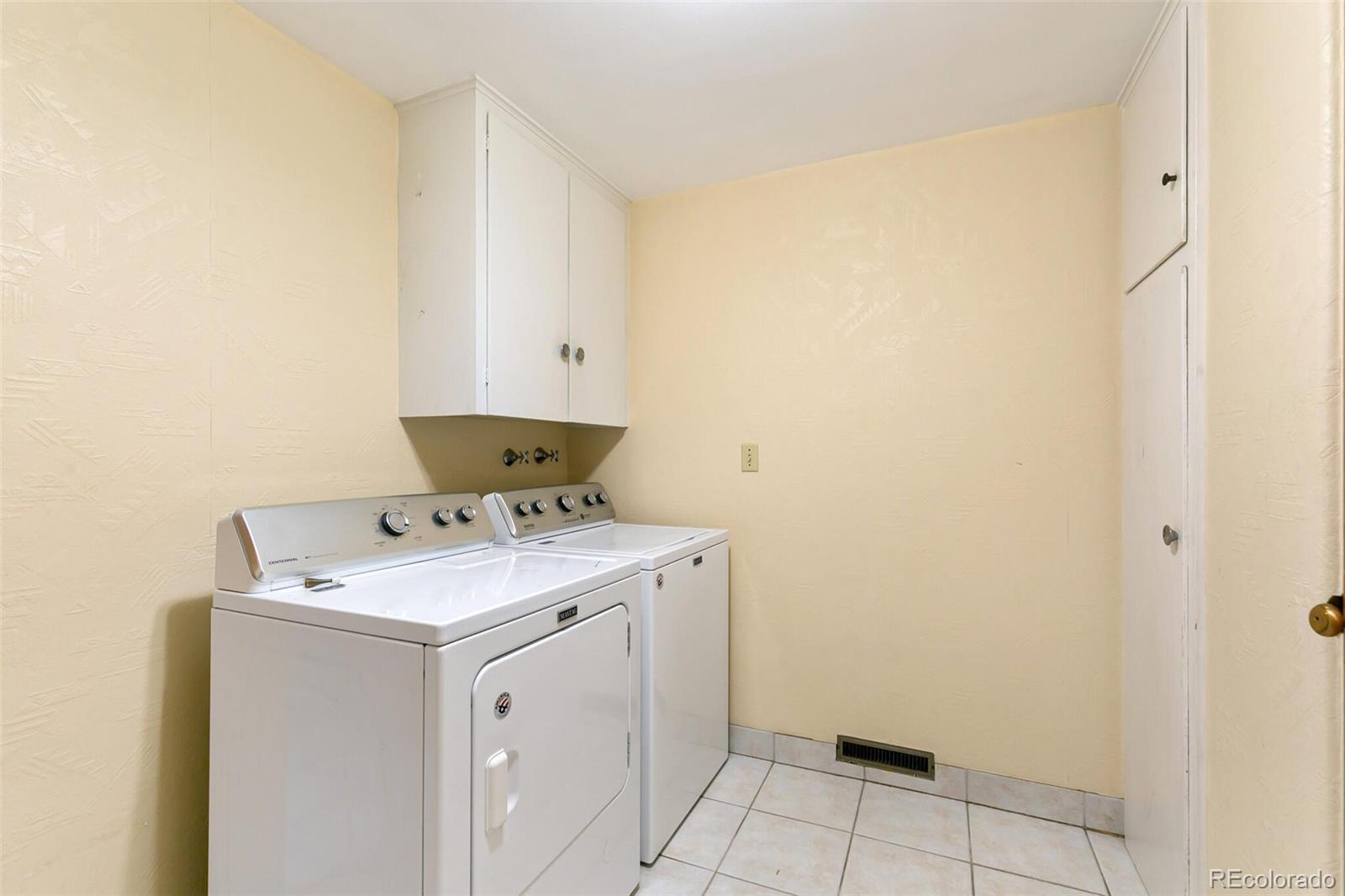 4650 Reed Street Wheat Ridge, CO 80033 - Photo 31 of 40 a utility room with a sink washer and dryer