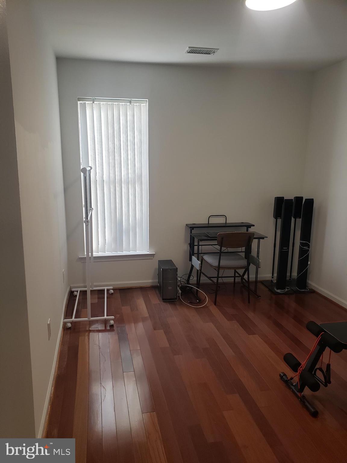 301 Byberry Road, Unit F7 Philadelphia, PA 19116 - Photo 15 of 19 a room with gym equipment and a window